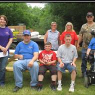 TMMK paint team presenting a donation to Caring Hearts in KY