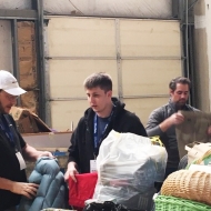 Employees from our Nashville Business Center sorting clothes at Grace Works, a food and clothing bank in TN