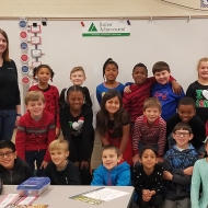 Katherine James of the Lexington office with her 3rd grade Junior Achievement class
