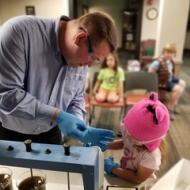 Justin Niles, SIA waste water, teaching chemistry to the Girl Scouts.