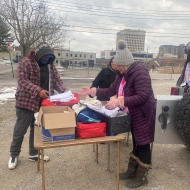 Brianna Cobb volunteered her time with friends at Lighthouse Ministries to hand out a collection of items for those experiencing homelessness